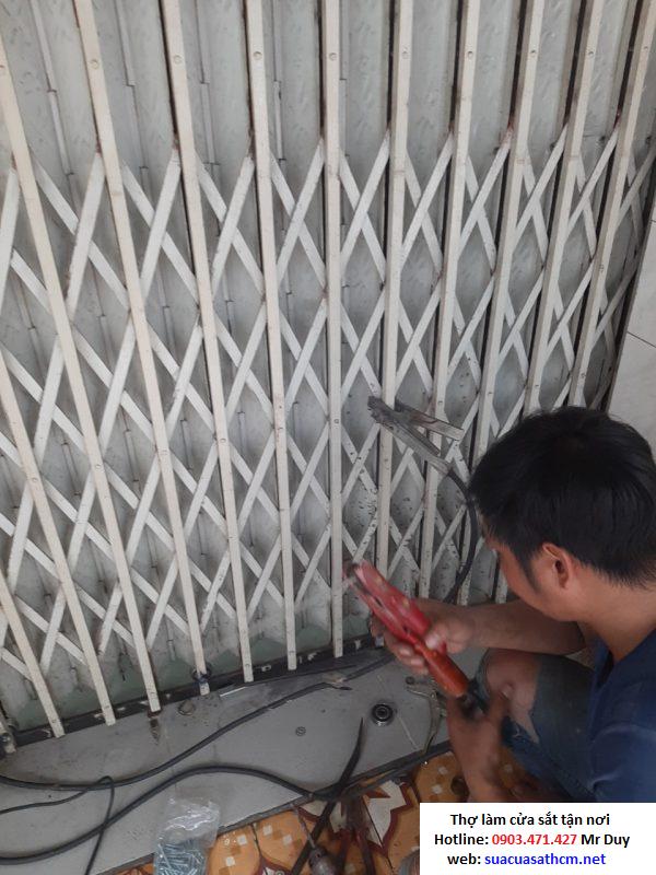 sửa cửa sắt sửa cửa sắt